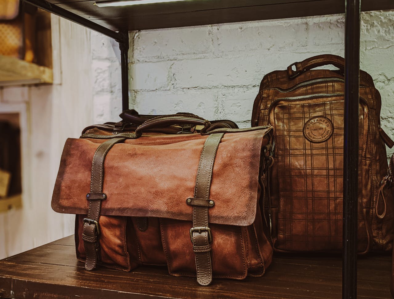 Services A selection of vintage leather bags on display in a Bengaluru store, showcasing craftsmanship and style.